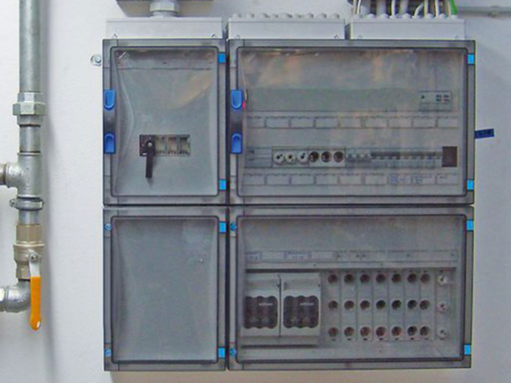 A modular enclosure box on the wall